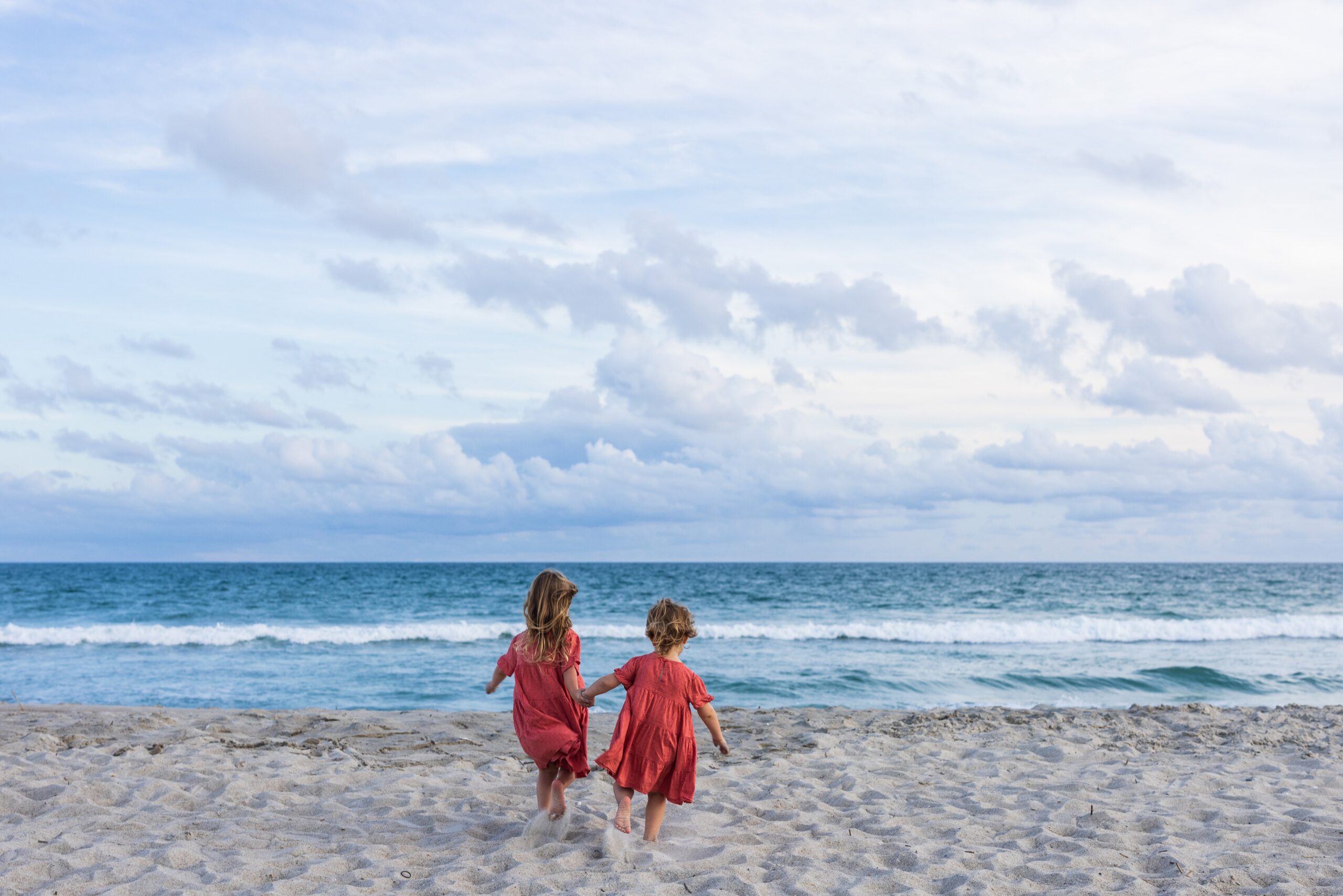 Girls playing on Emerald Isle beach Girls playing on Emerald Isle beach